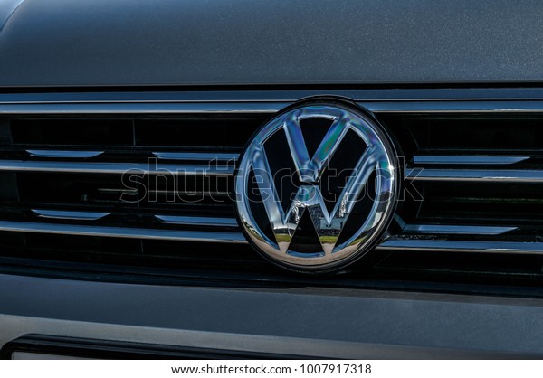 MOSCOW, RUSSIA - SEPTEMBER 22,\
2017 VOLKSWAGEN TIGUAN front side view. Compact crossover SUV.\
Volkswagen close up logo. Volkswagen car logo bage. VW plate\
logo.