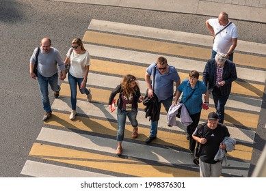 Moscow, Russia, September 6, 2019 - Top View Of People Crossing A Pedestrian Crossing