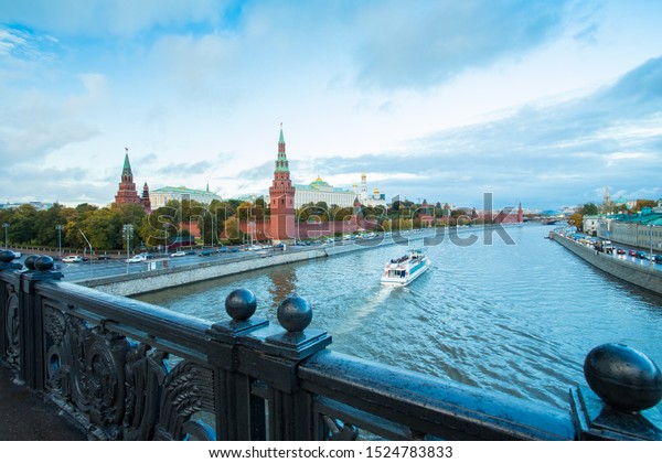 Moscow, Russia. View From\
Big Stone Bridge On Moscow Kremlin  With Floating Ship On Moscow\
River At Autumn.