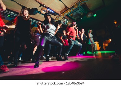 MOSCOW, RUSSIAN FEDERATION - OCTOBER 13, 2018: Cuban Dance Teachers Conduct A Master Class In Salsa And Reggaeton In The Night Club Tiki Bar.