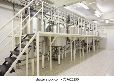 MOSCOW - SEP 15, 2016: Reservoirs in workshop of cosmetics factory Freedom was created on basis of first in Russia perfume factory Rally and Co, which was founded in 1843