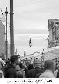 Moscow - September 10, 2016: A Gymnast Performs A Backflip In Mid Air From A Trampoline During The 2016 Moscow Day Celebrations.