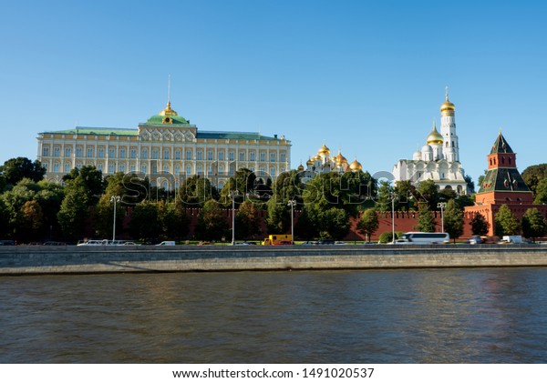 Moscow\
skyline - view of Moscow River, embankment, Kremlin, Moscow City\
district in sunny summer day. (high\
resolution)
