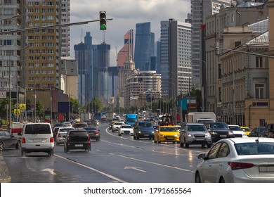 Moscow Traffic Of Cars. Novy Arbat Street In Rainy Summer Day.