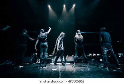 MOSCOW-10 SEPTEMBER,2015:Rasta Man Singer On Stage.Famous Rap Singer With Long Rasta Dread Locks.Concert Of Rapper Detsl,LeTruk.Rastafari Style Man Sing In Microphone On Scene.Rap Concert Background