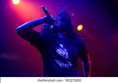 MOSCOW-2 FEBRUARY,2017:Famous Hip Hop Singer Waka Flocka Performing Live Music Show On Stage.Bright Concert Lighting On Popular Rapper.Cool Braided African American Singer With Microphone On Scene