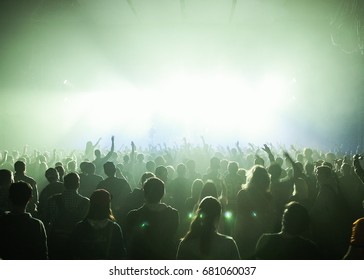 MOSCOW-20 FEBRUARY,2015: Crowded Dancefloor In Nightclub.Big Live Music Show In The Club.People Have Fun On Concert.Big Crowd On Sold Out Festival.Rave Party People On Dance Floor.Techno Music Party