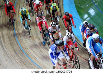 MOSCOW-2019, June: Cycling Track Race UCI Grand Prix Moscow On June 01-03, 2019 In Krylatskoe Velodrome, Moscow, Russia. Group Of Cyclists Riding Fast During Track Point Race 