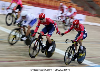 MOSCOW-2019, June: Cycling Track Race UCI Grand Prix Moscow On June 01-03, 2019 In Krylatskoe Velodrome, Moscow, Russia. Cyclists Of Belarus Team Keep In Touch During Madison Cycling Race Zoom Effect