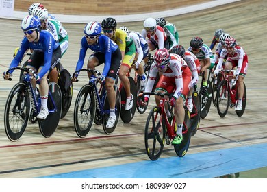 MOSCOW-2019, June: Cycling Track Race UCI Grand Prix Moscow On June 01-03, 2019 In Krylatskoe Velodrome, Moscow, Russia. Group Of Cyclists Riding Fast During Track Point Race 