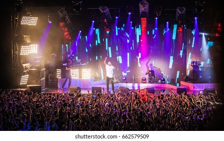 MOSCOW-30 NOVEMBER,2014: Music Concert Of Rap Singer LOne.Live Entertainment Event In Nightclub.Rapper With Mic On Scene In Front Of Big Concert Audience.Night Festival With Big Group Of Music Fans