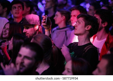 MOSCOW-6 FEBRUARY,2017: Festival crowd on hip hop concert.Young people on dance floor in night club.Dj concert audience on music show.Boy filming musician on smart phone - Shutterstock ID 587719934