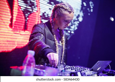 MOSCOW-6 FEBRUARY,2017:Young Girl Mix Music.Party Dj Play Music On Stage At Party In Night Club.Young Female Disc Jockey Plays Tracks On Hip Hop Concert