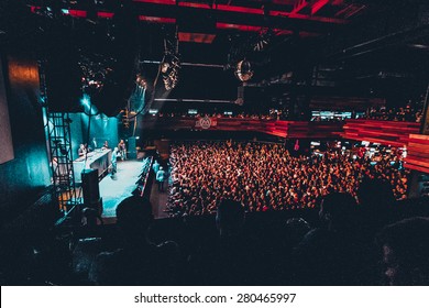 MOSCOW-8 JULY,2014:Night Club Concert Crowd View From Top.Overhead Shot Of Concert Audience Partying On Dance Floor In Music Hall.Rap Concert Of DMX In Nightclub.Big Group Of People On Club Concert