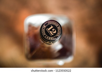 MOSCOW/RUSSIA - JUNE 25, 2018: Johnnie Walker Black Label bottle cork on whiskey bottle close-up. Johnnie Walker is Scotch blended whiskey and one of famous brands in world