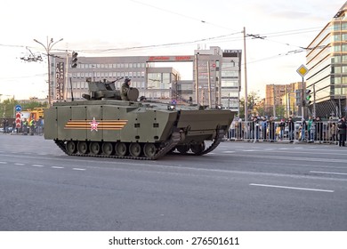 MOSCOW/RUSSIA - MAY 4: Kurganets-25 Amphibious Armored Personnel Carrier (APC) Based On Armata Next Generation Heavy Military Vehicle Combat Platform On Night Parade Rehearsal On May 4, 2015 In Moscow