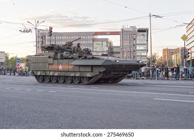 MOSCOW/RUSSIA - MAY 4: T-15 IFV Tracked Heavy Armored Vehicle Based On Next Generation Heavy Military Vehicle Combat Platform And People On Roadside On Night Parade Rehearsal On May 4, 2015 In Moscow.