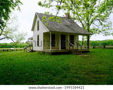 The Moses Carver house at the George Washington Carver National Monument. The small white 1881 farmhouse was once the home of Moses Carver who owned George Washington Carver as an enslaved person.