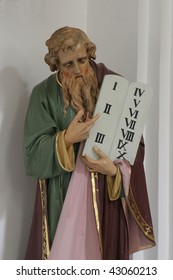 Moses holding the Ten Commandments