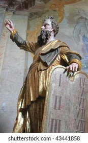 Moses holding the Ten Commandments