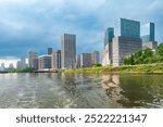 Moskva River and urban architecture of the capital downtown on a summer day. View of Moscow river embankment from cruise boat