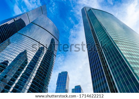 Moskva-city. Bottom view of the skyscrapers in the center of the Russian capital. Business center of Moscow. Office rental. Office real estate. High-rise buildings against the blue sky.