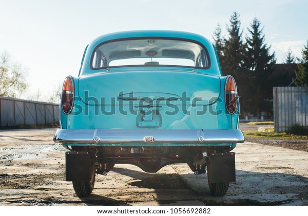 a\
moskvich soviet car mentol color. old retro\
car.