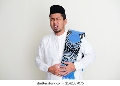 Moslem Asian Man Suffer Painful Stomach Ache During Fasting Month