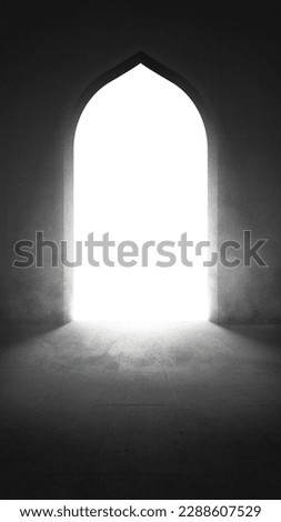 Mosque door with a bright light background