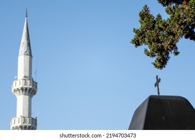 Mosque Minaret And Church Cross Side By Side. Yenikoy Village. Sariyer District. Istanbul. Turkey.