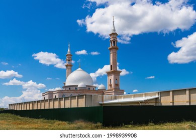 A Mosque Under A Blue Cloudy Sky. A Muslim Mosque Under Construction On A Sunny Day.