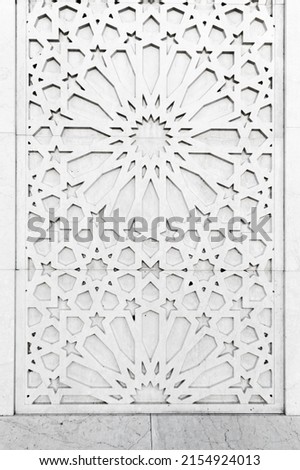 Mosque wall decoration. Abstract white Arabic pattern, vertical background texture