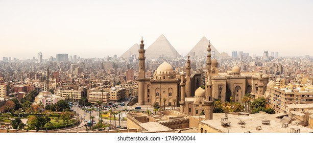 The Mosque-Madrassa of Sultan Hassan In front of the Giza Pyramids, Cairo, Egypt