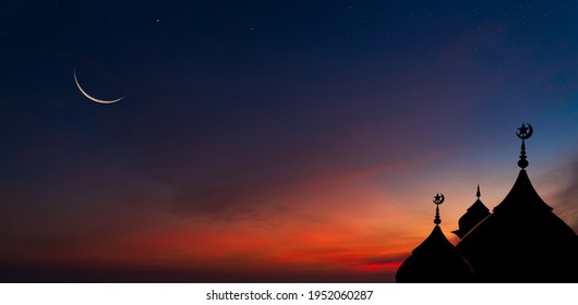 Mosques Dome on dark blue twilight sky and Crescent Moon on background, symbol islamic religion Ramadan and free space for text arabic, Eid al-Adha, Eid al-fitr, Mubarak, Islamic new year Muharram  - Shutterstock ID 1952060287