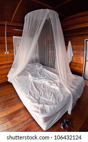 Mosquito Net On The Bed In Thai Bungalow