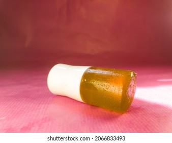 A Mosquito Repellent Gel Stick On A Magenta Paper Background