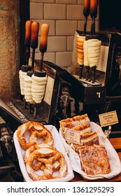 The Most Popular Dessert In Prague. Grilled Food. Manufacturer Trdelnikov In Prague. Selective Focus