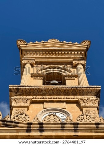 Mosta, Malta - clock tower in Mosta, Malta, view up
