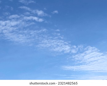 Mostly blue skies with light clouds