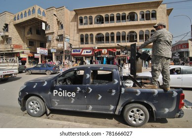 Mosul, Iraq - 4/23/2017: Members Of Iraq Police In Mosul, Guarding In Street. 