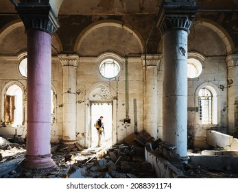 Mosul, Iraq, November 21 2018.  An unknown security contractor stands in the doorway of the ruins of a Church destroyed in the fighting with ISIS.