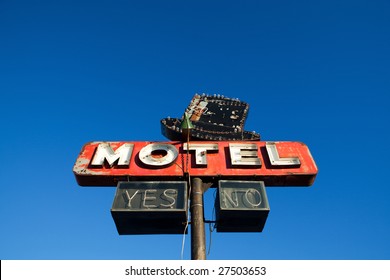 motel sign - abandoned motel retro style against clear blue sky
