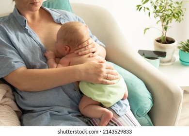 Mothed and baby, breastfeeding in laid back position