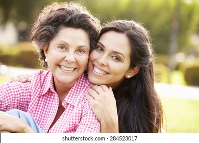 Mother With Adult Daughter In Park Together