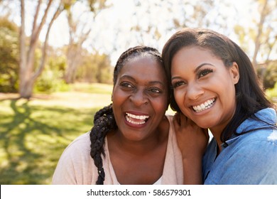 Mother And Adult Daughter In Park Together