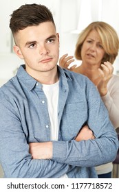 Mother Arguing With Teenage Son At Home