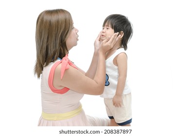 Mother And Asian Baby Crying