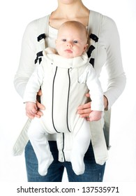 Mother With Baby In Baby Carrier Isolated On White