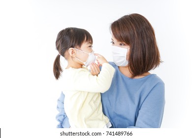 Mother And Baby With Cold Prophylaxis Mask