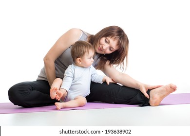 mother with baby doing gymnastics and fitness exercises
